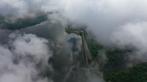 Flying in the clouds. View from the sky on beautiful nature background. White clouds are moving. Natural landscape from the air among fluffy clouds. Aerial view.