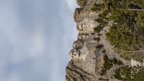 Vertical---Clouds-In-The-Sky-Soaring-Above-Mount-Rushmore-National-Memorial-In-South-Dakota