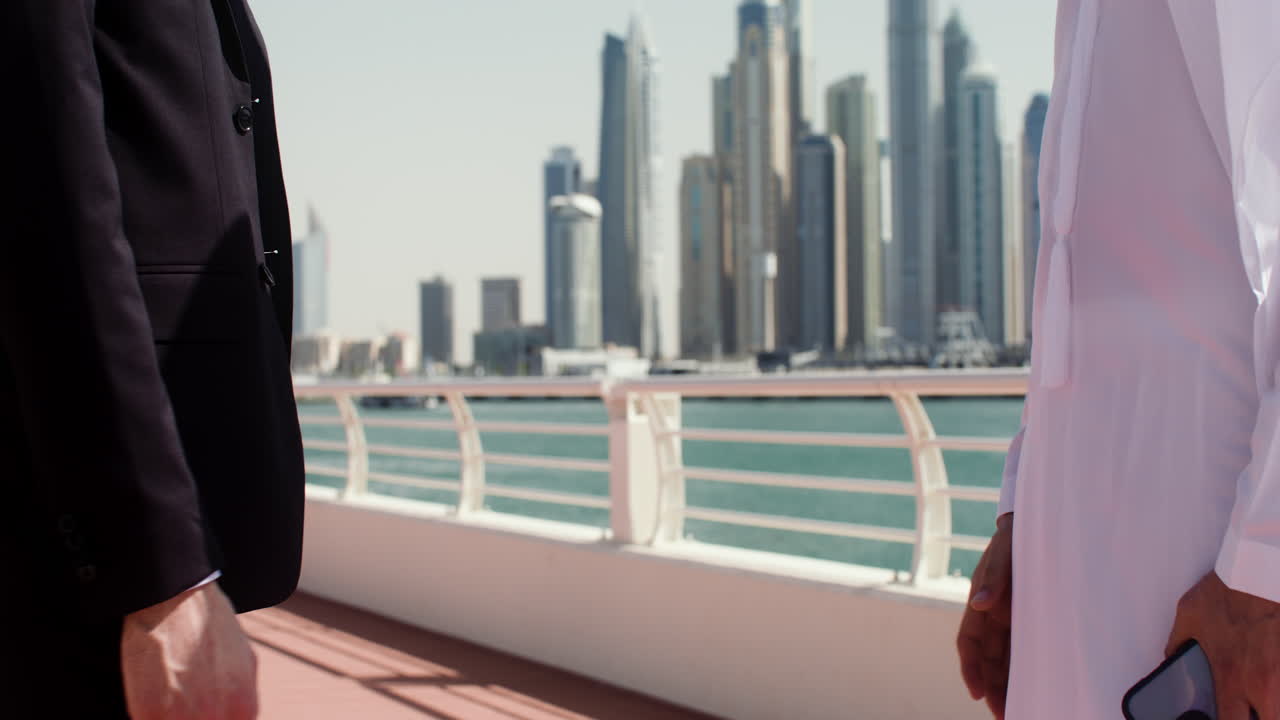 Two people talking about business