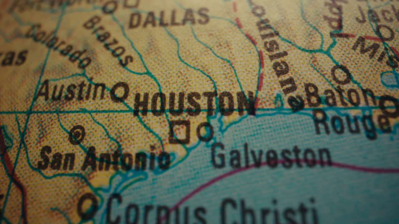Close-up of a Texas map, highlighting major cities