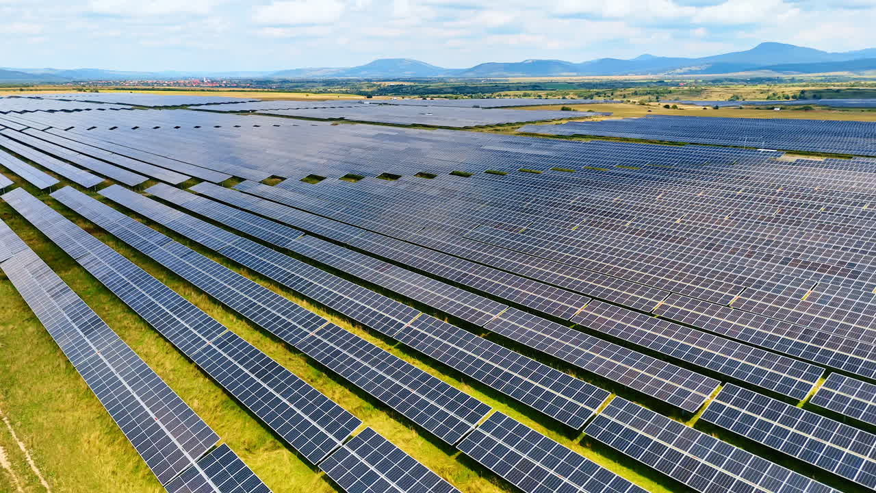 Wide solar power farm landscape. Aerial wide landscape view of a solar power farm in Romania