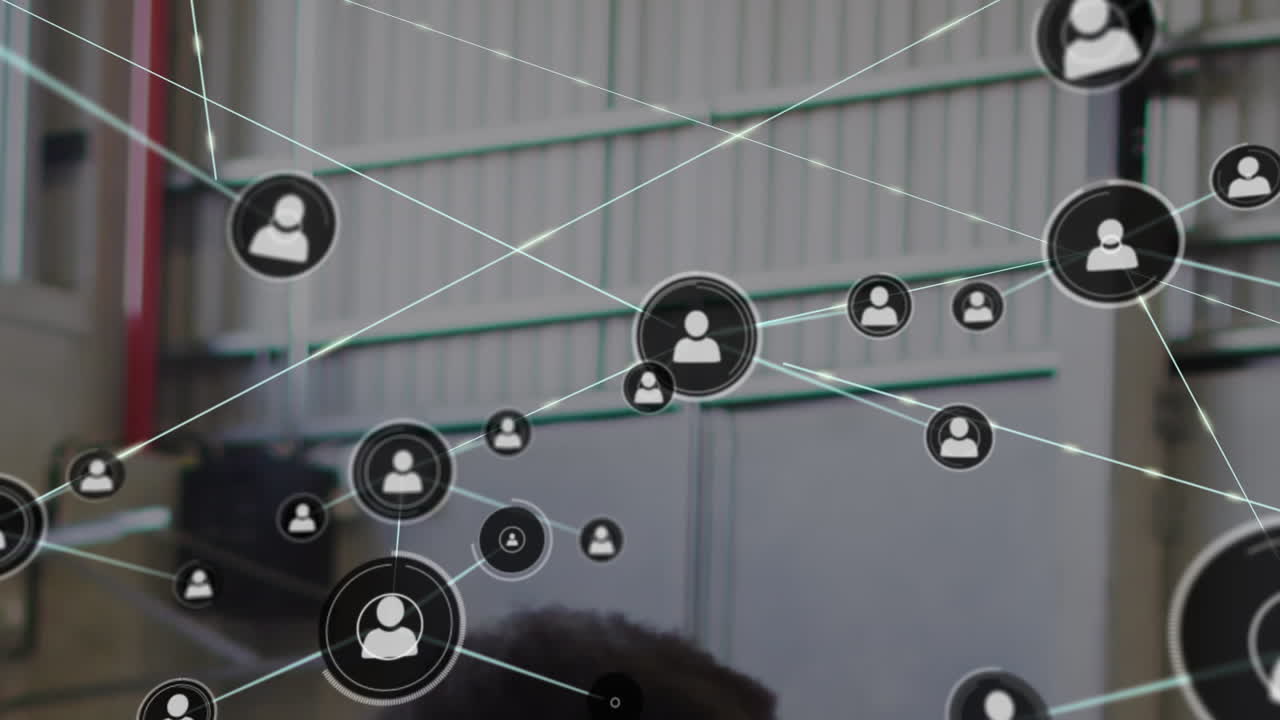 Animation of network of connections with icons over warehouse