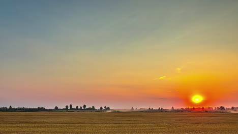 A-Time-Lapse-Shot-Of-A-Sunrise-View-With-A-Wind-Shear-And-A-Crop-Field-Landscape