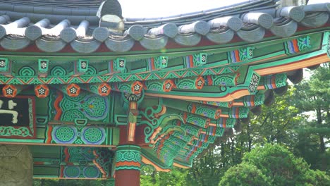 dancheong - korean painted roof of pavilion in tomb of seven hundred patriots in south korea