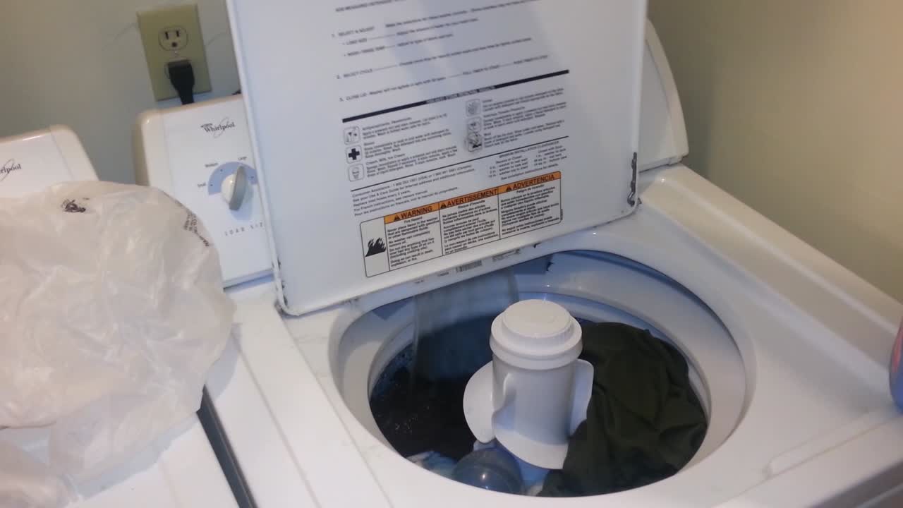 Closing the Top to a Washing Machine