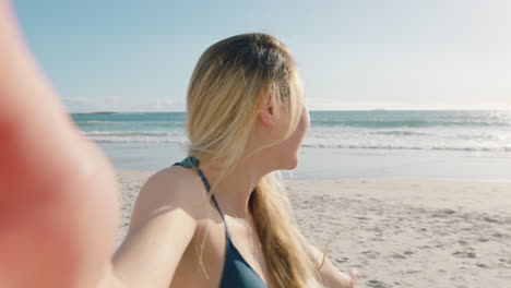 beautiful woman having video chat on beach girl waving at camera sharing summer vacation using smartphone showing travel adventure having fun on holiday