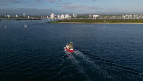 aerial views over the spit and seaway on the northern end of the gold coast in the morning on a sunny day.