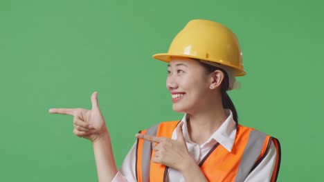 smiling engineer pointing