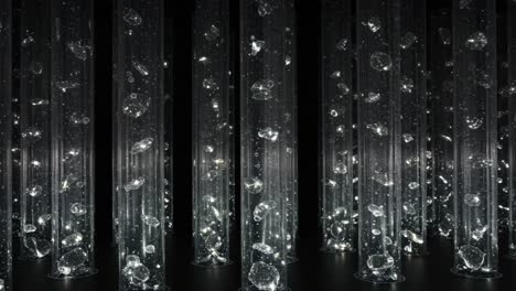bubbles and illuminated tubes: a mesmerizing display of light, texture, and reflection captured in this captivating multimedia installation