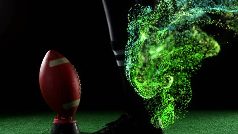 animation of glowing green particles moving over rugby player kicking ball