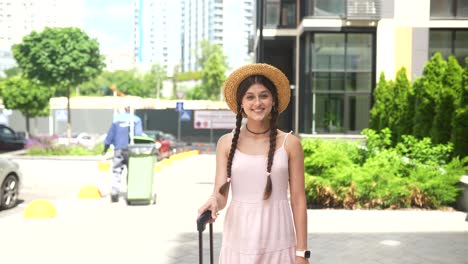 smiling teenage girl taking a selfie on the street