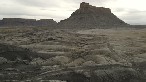 revealing drone footage of factory butte's geological formations,utah aerial