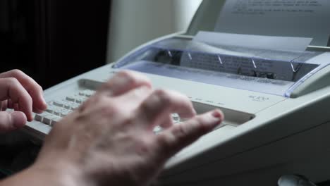 Close-Up-of-Person-Typing-on-Typewriter-in-Slow-Motion