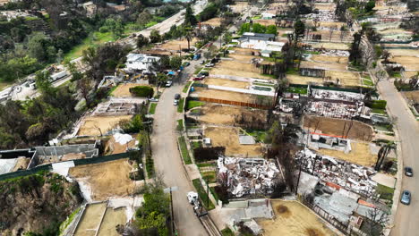 aerial view circling cleared yards, fire revovery of pacific palisades, la