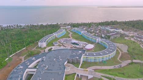 drone flying over temptation miches new resort in dominican republic with sea in background