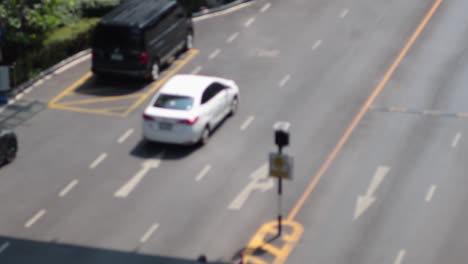 vehicles moving through a city intersection