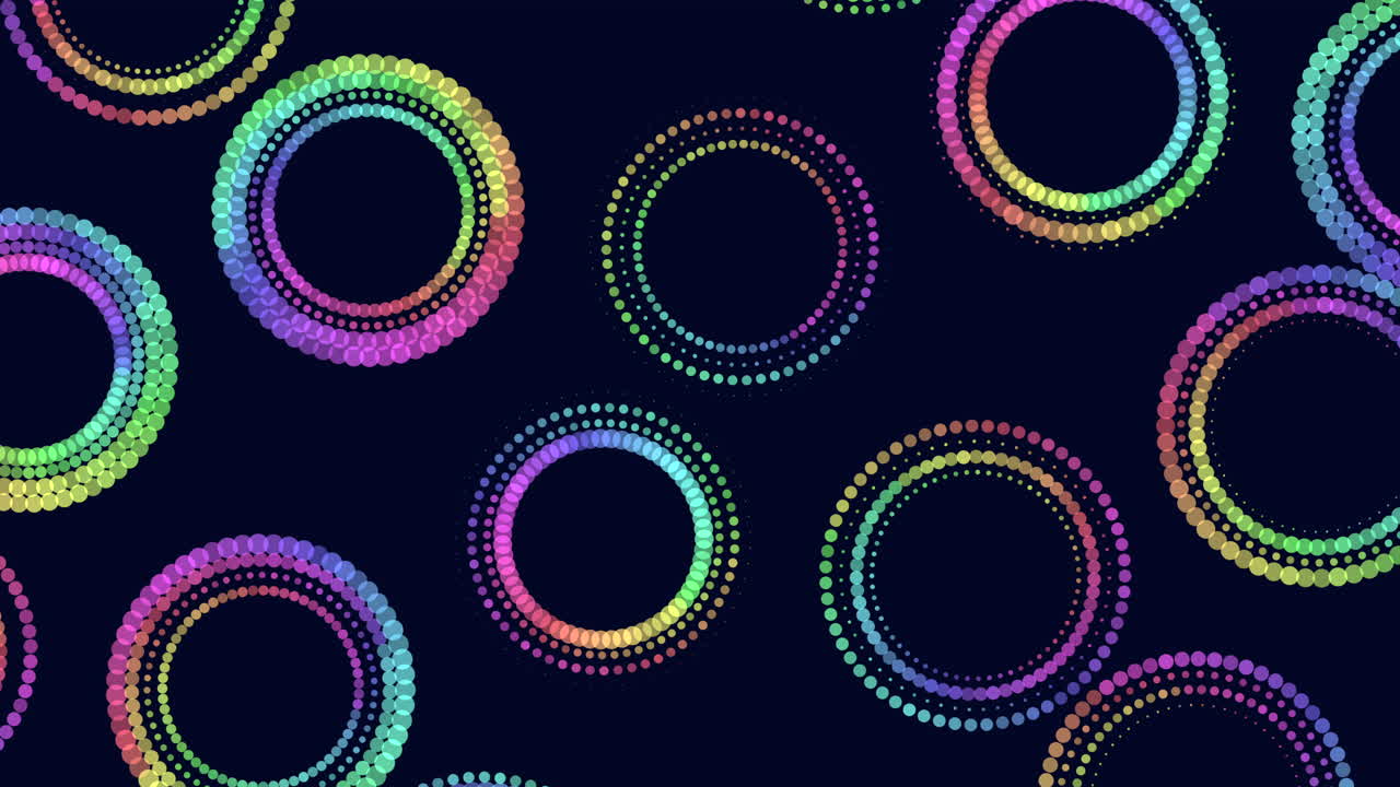 A vibrant and playful seamless pattern of colorful circles on a black background. Circles of various sizes, shades of pink, purple, blue, green, and yellow, overlap in a circular arrangement