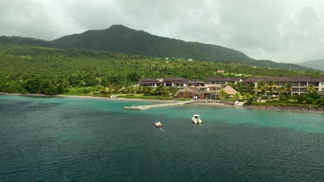 Aerial-view-of-fishing-boat-approaching-dock