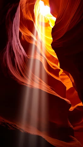sunbeams illuminating the winding walls of antelope canyon