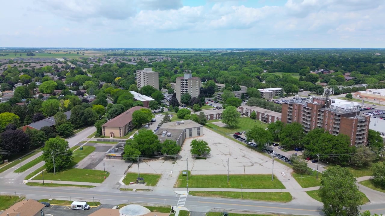 Chatham-Kent, Ontario Canada aerial view flying over buildings and green trees