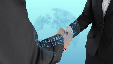 binary coding on spinning globe over mid section of businessman and businesswoman shaking hands