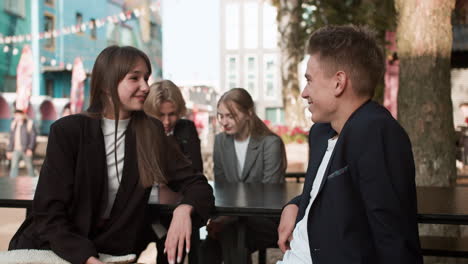 Teenagers-in-love-talking-outdoors