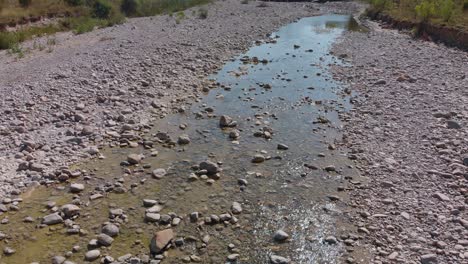 Aerial-fly-over-dried-up-river-in-Europe