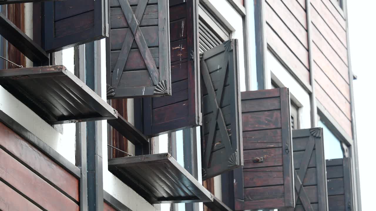 Detailed view of a building with beautiful wooden shutters
