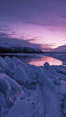 frozen icelandic landscape at sunset