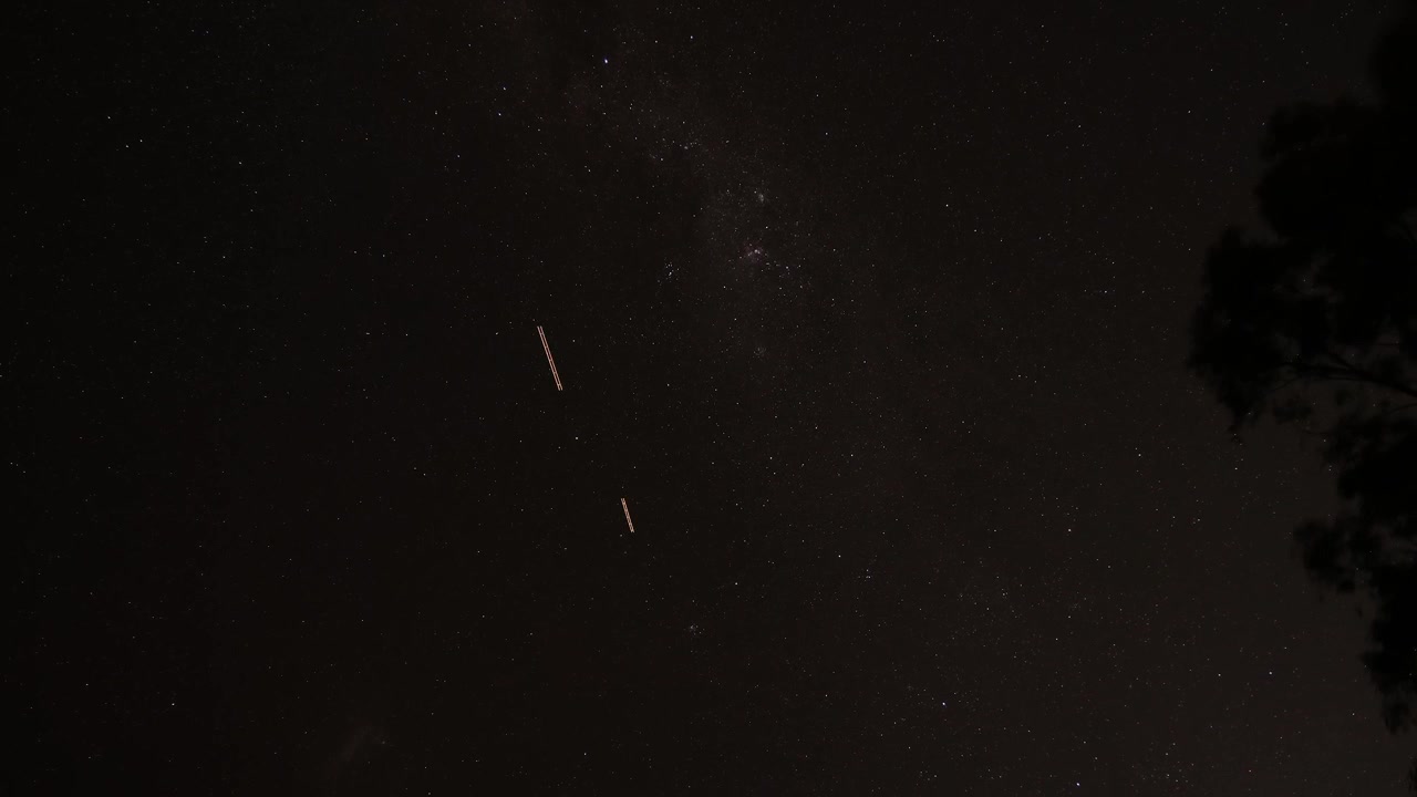 Meteor streaks across a starry night sky