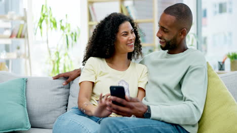 couple, phone and laughing on sofa in home