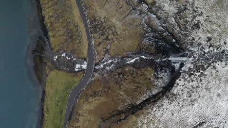 faroe islands, 4k aerial top down of beautiful fossá waterfall