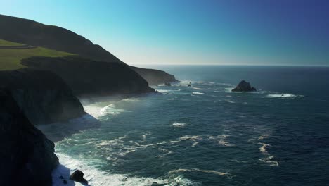 drone shot of waves crashing on scenic coastline at big sur state park off pacific coast highway in california 9