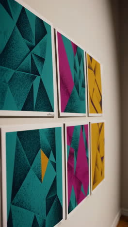 colorful abstract geometric art prints on a wall