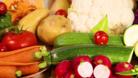 assorted vegetables displayed on a white background