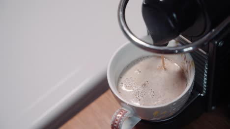 top down view of coffee dripping into mug with room for text 4k 60p