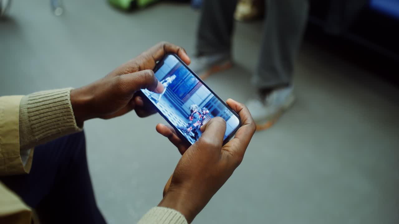 Playing mobile game on a smartphone