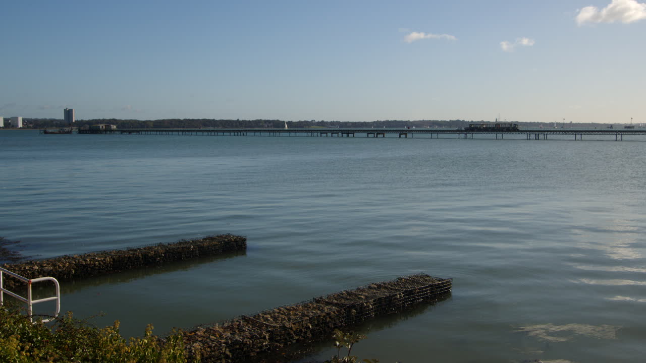 Hythe Railway Pier train going right to left of frame, Taken from Hythe Marina