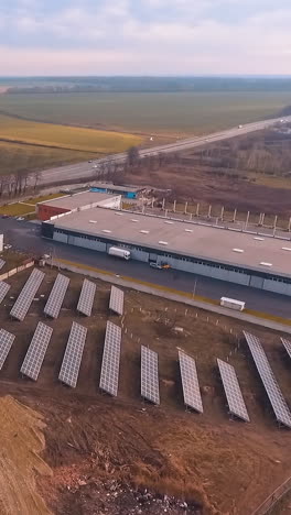 solar panels in aerial view. aerial view over solar panel farm outside