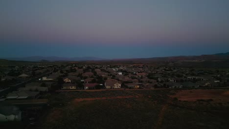 aerial view of neighborhoods in hurricane utah at dusk - drone shot