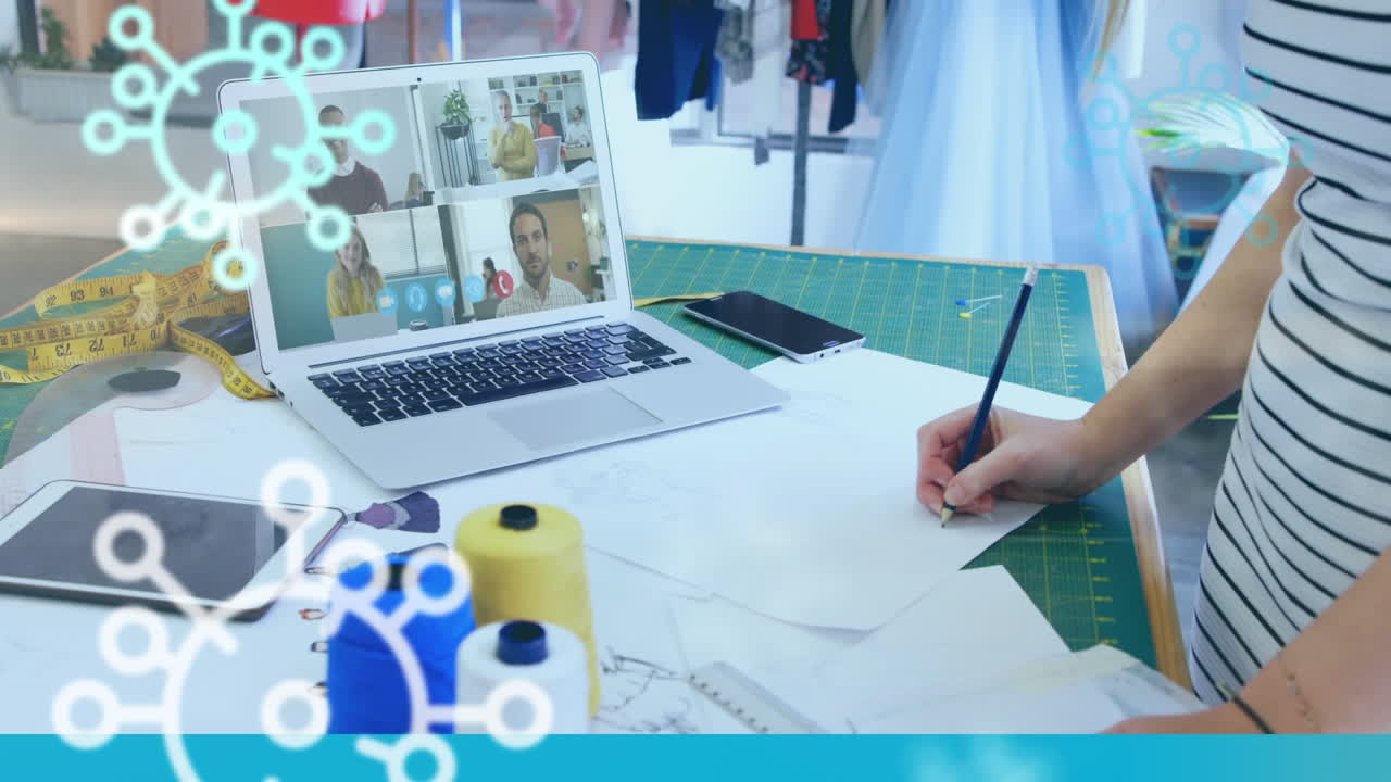 디지털 코로나바이러스 세포가 노트북 화면에 있는 사람들 위에 있습니다.