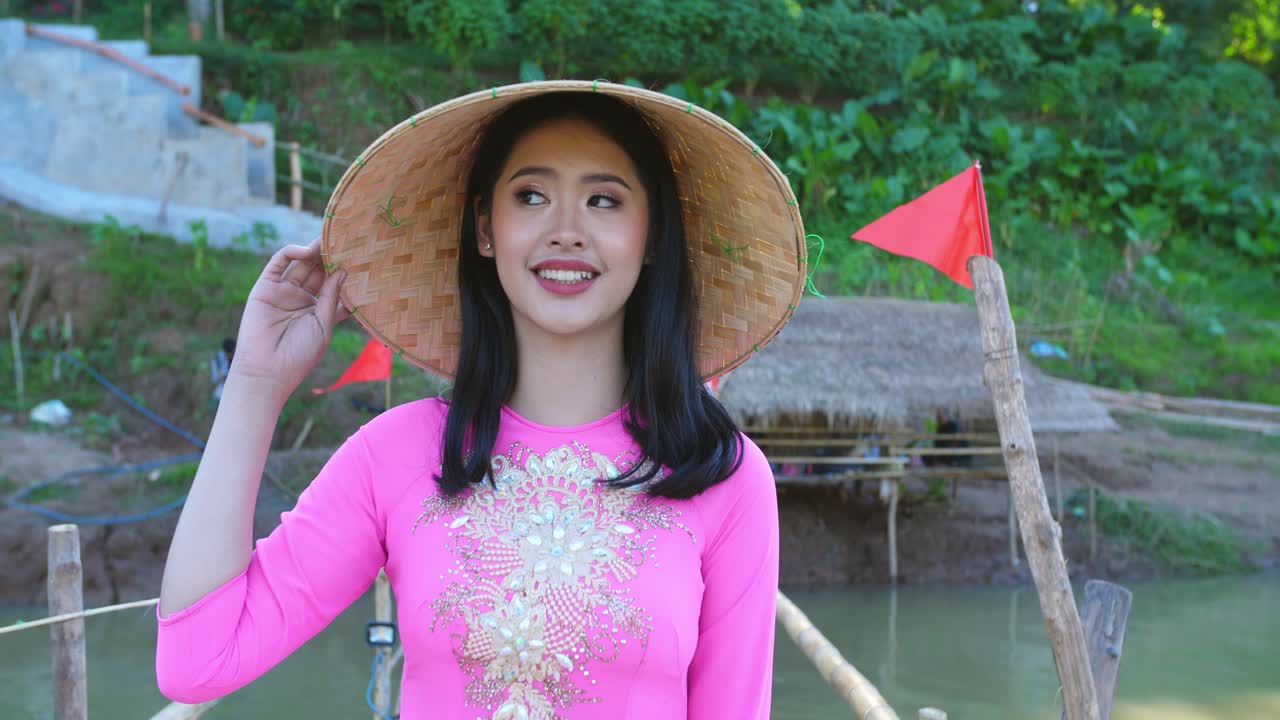 Girl In National Costume Of Vietnam Walking On Bamboo Bridge, Video In 4K