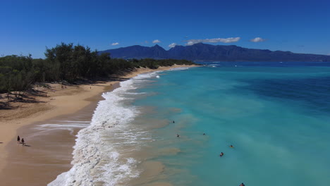 Flying-over-Baldwin-Beach-in-Maui,-Hawaii