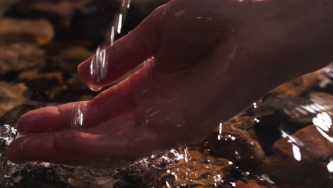 Hand-trying-to-take-water