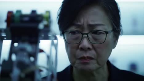 a focused scientist examines innovative equipment in a high-tech laboratory, portraying determination and insight in exploration of new discoveries