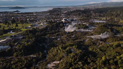 drone fly over te puia geothermal preserve, hot springs and geyser, whakarewarewa, rotorua, new zealand