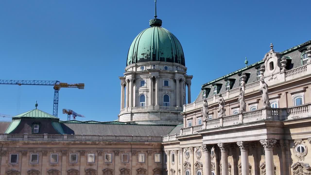 Construction crane working on Buda Castle, showcasing the blend of old and new in Budapest's architectural landscape