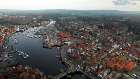 Aerial-View-Of-Whitby-Seaside-Town-With-River-Esk-And-Harbor-In-Yorkshire,-Northern-England