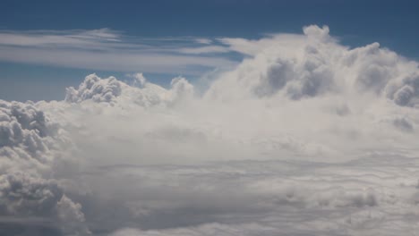 cloud surfing through a window seat