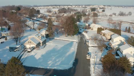 aerial tracking shot through neighborhood housing development